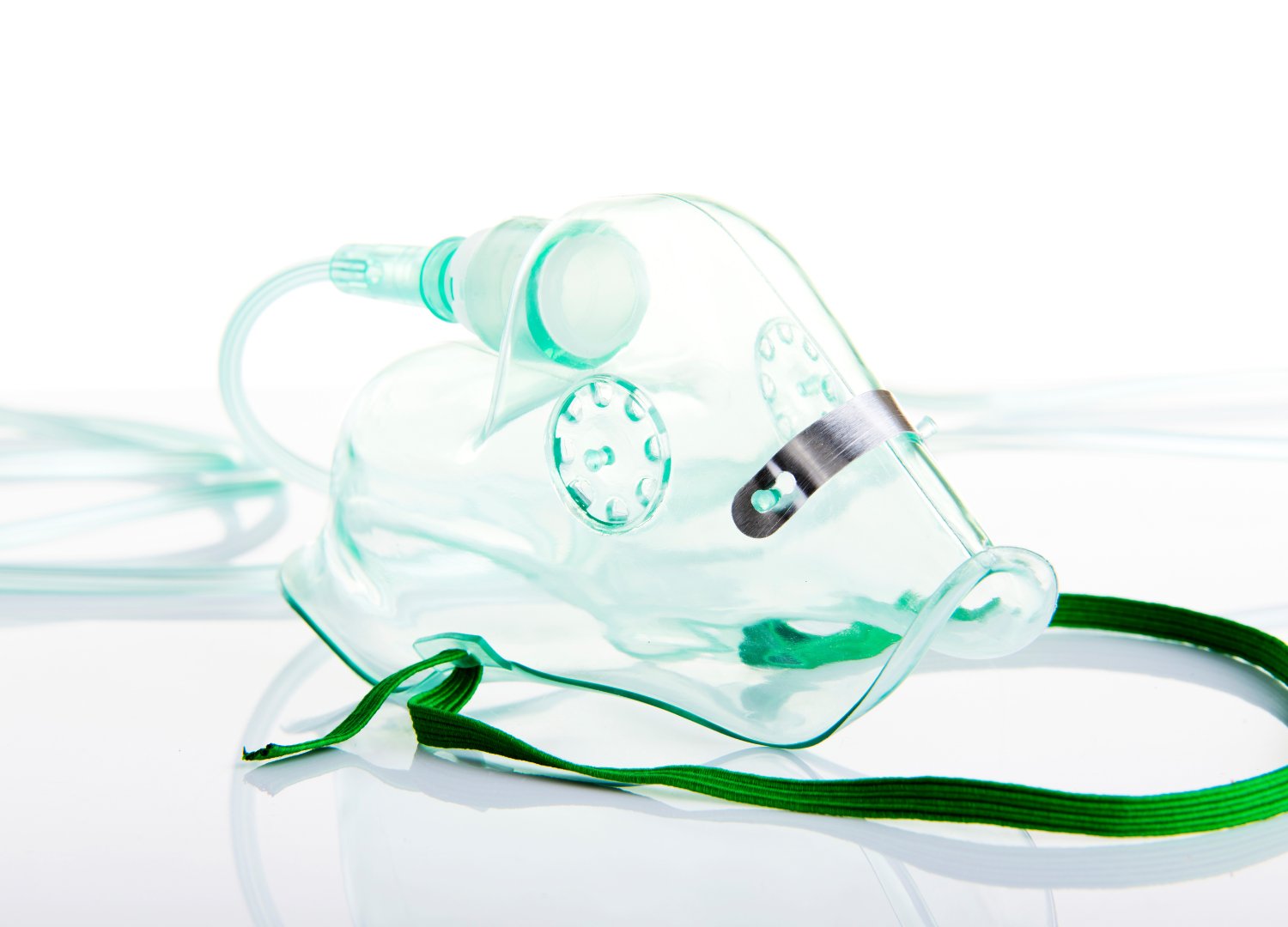 Oxygen mask with attached tubing used for medical oxygen therapy